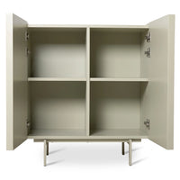inside of a 4 compartment credenza in a beige color