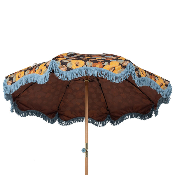retro style parasol with flower fabric and blue fringes