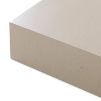 detail of  sand colored wooden low plateau table