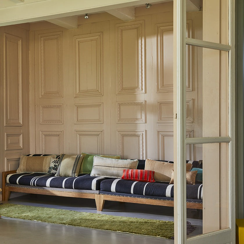 lounge sofa with different shape, textured and colored lumbar and throw pillows