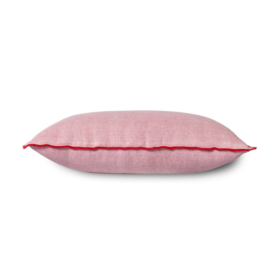 pink linen lumbar pillow with red cotton trim