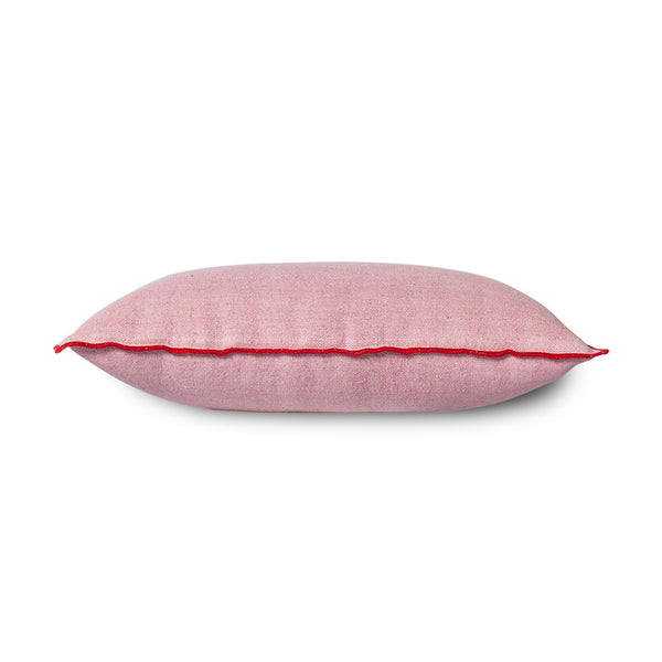 pink linen lumbar pillow with red cotton trim