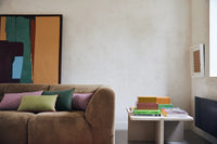 brown retro style corduroy rib element couch with linen  pillows with contrasting trims