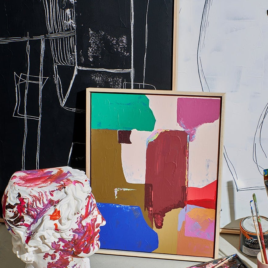 abstract paintings and sculpture in studio
