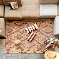 striped lumbar pillow on Berber rug