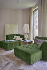 seating area with daybeds n green and sand colored bohemian style table lamp