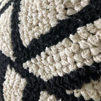 detail of hand knotted pillow