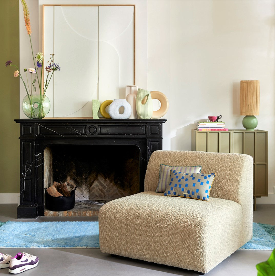 living room with home décor on fireplace