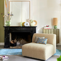 living room with home décor on fireplace