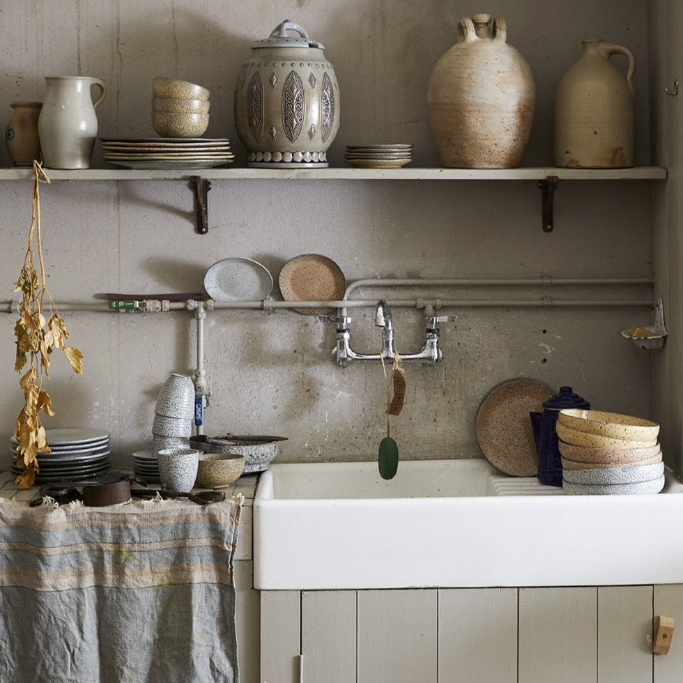 kitchen with gradient ceramics in different colors and finishes