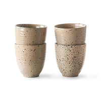 set of 4 stoneware mugs in a taupe color
