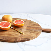 rustic board with fruit