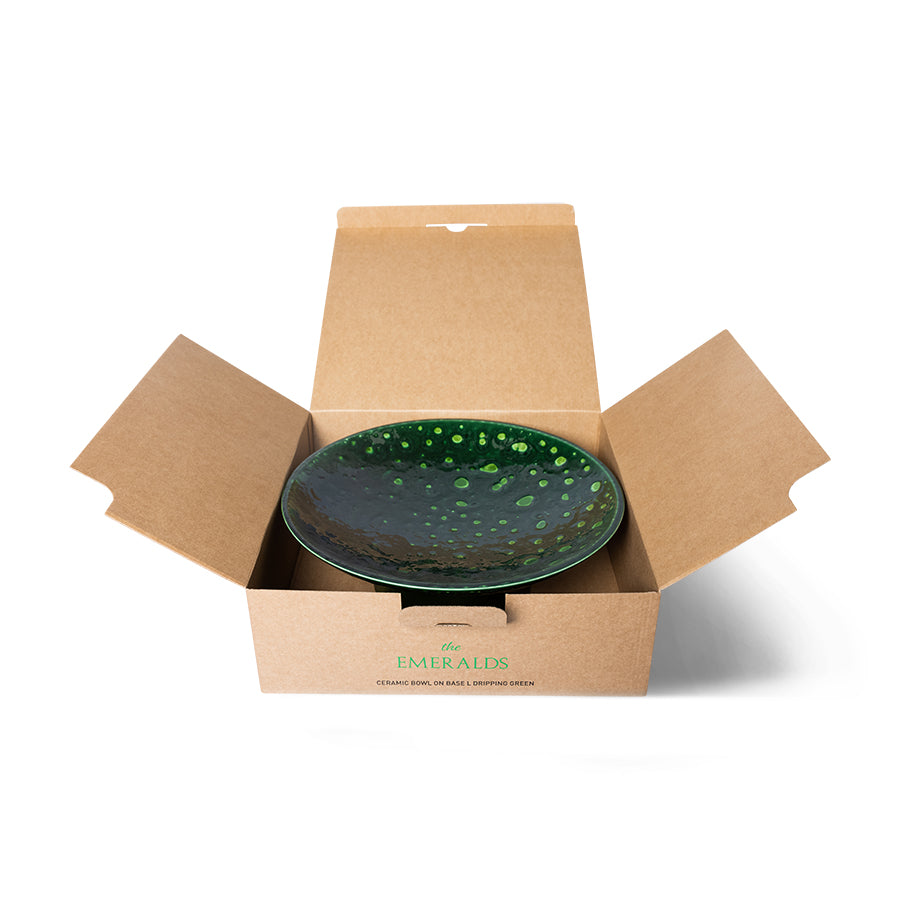green drippy bowl on foot in a brown box