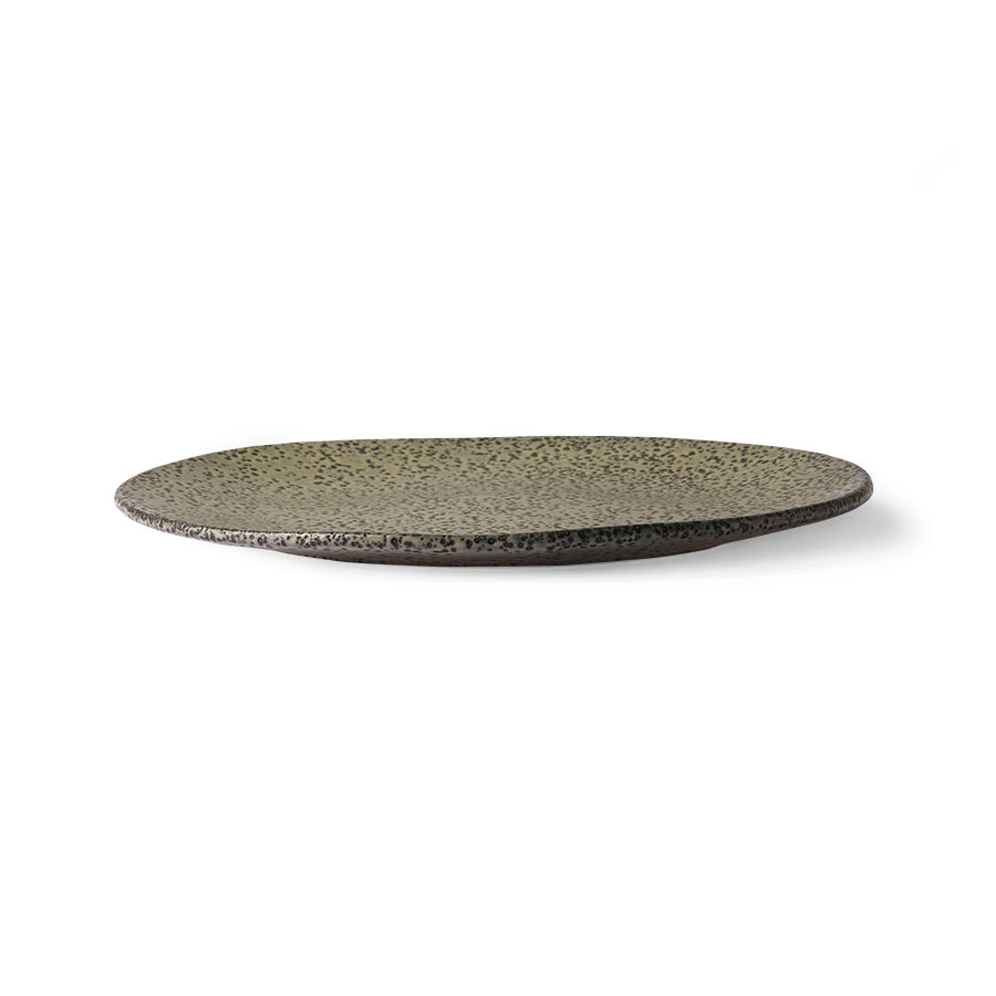 side view of organic shaped green dinner plate