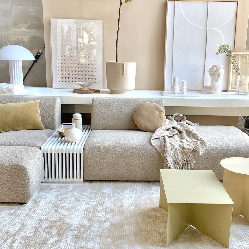 white slatted bench used as  element in sofa