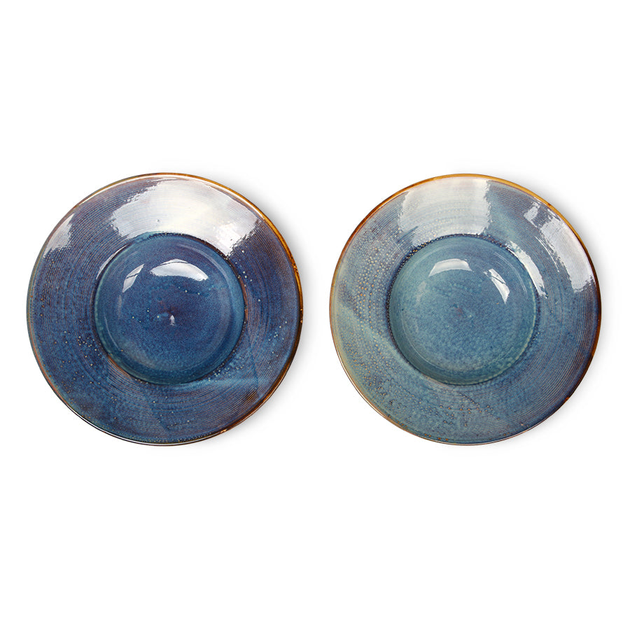 different finishes of the blue ceramic plates from Home Chef Collection