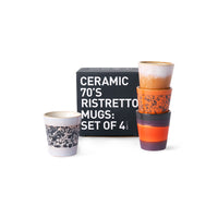 4 different colors ristretto cups with black box on white background