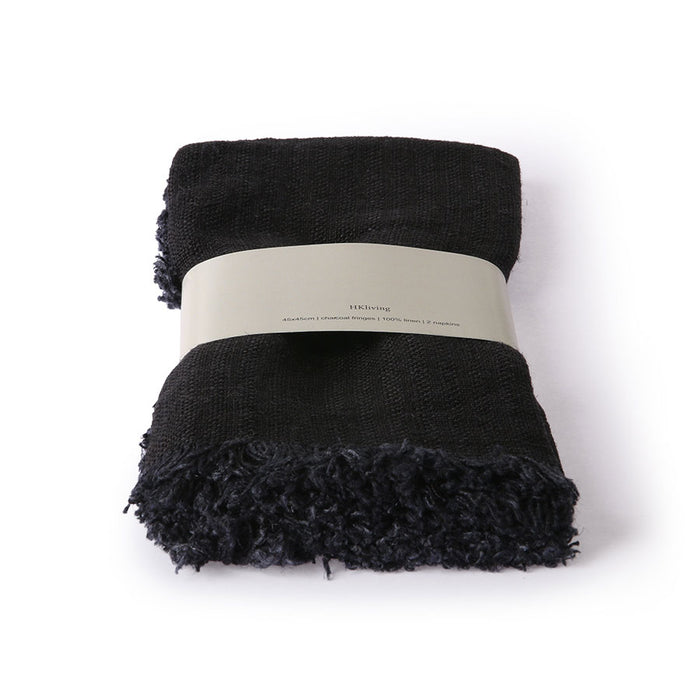 two linen napkins in charcoal color with paper wrapping