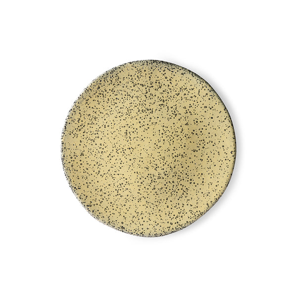 organic shaped, yellow plate with black speckles