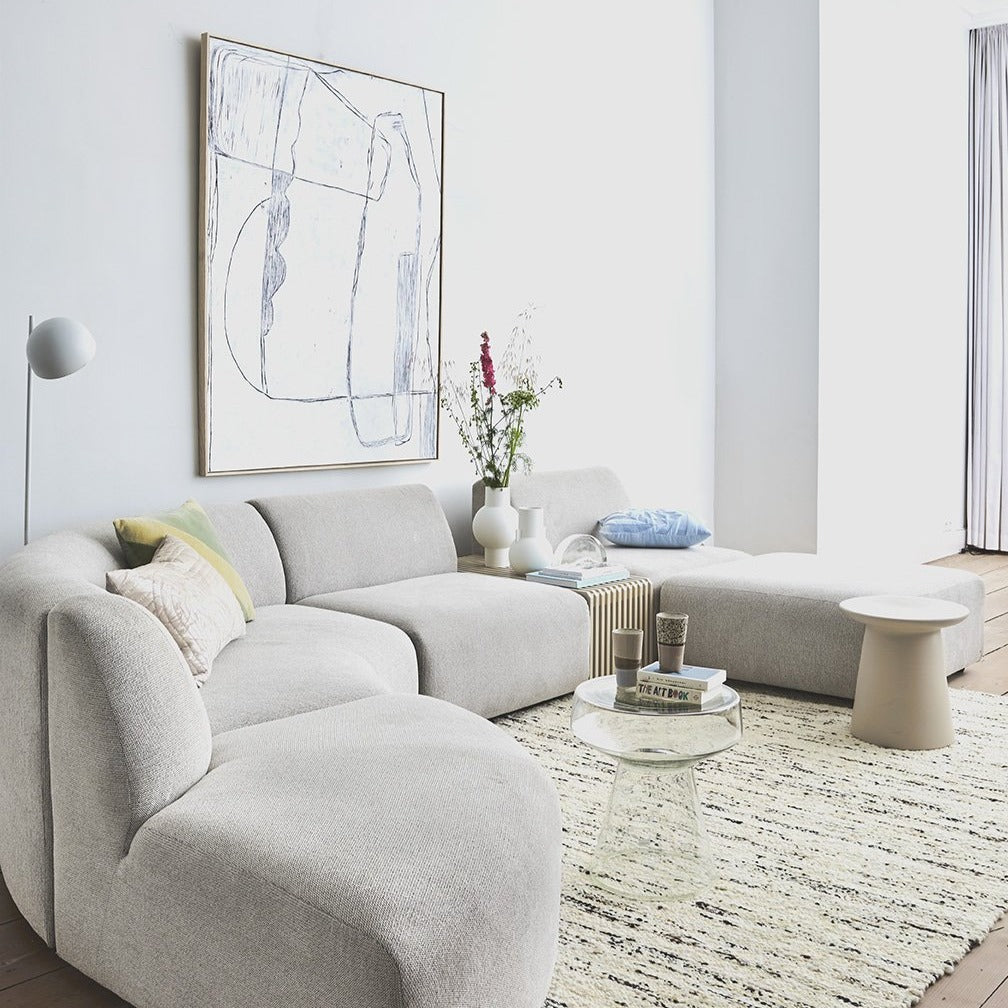 mid century modern living room with earthenware side table