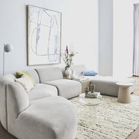 mid century modern living room with earthenware side table