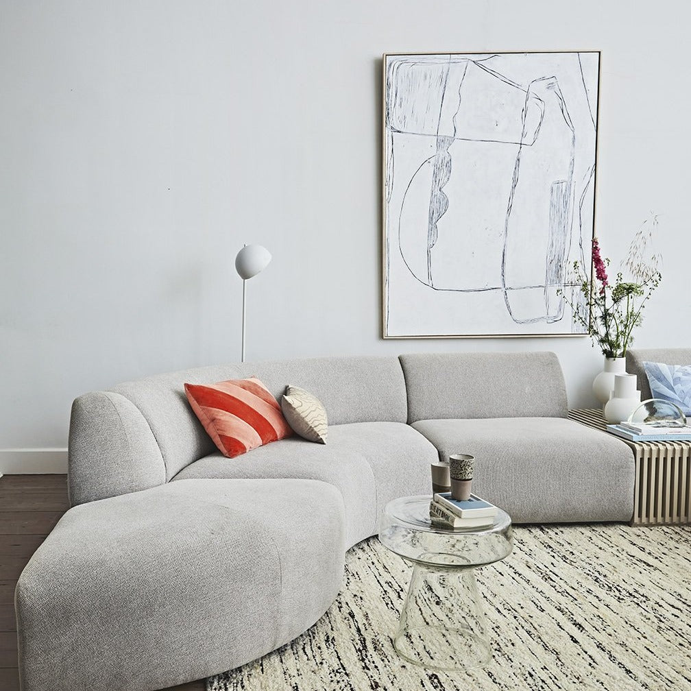 modern living room with large white brutalism canvas on wall