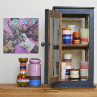 antigue display cabinet with 70's ceramics and jar with lid