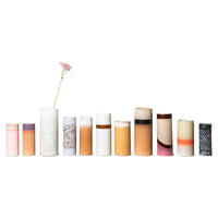 different color and sizes flower vases in a row