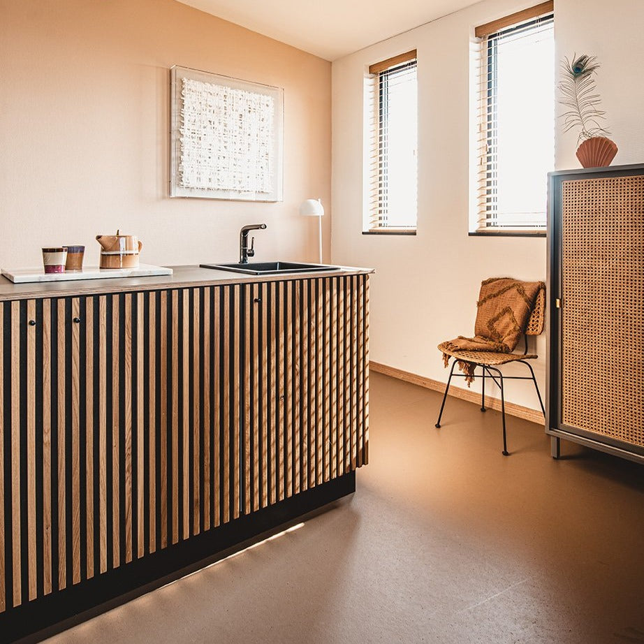 kitchen with grey sliding door cabinet