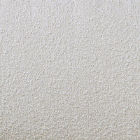 close up picture of the fabric from the HKliving usa Retro lounge fauteuil boucle - cream